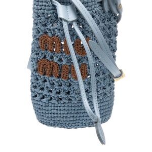 Miu Miu Blue and Brown, can be used as a crossbody or shoulder bag.